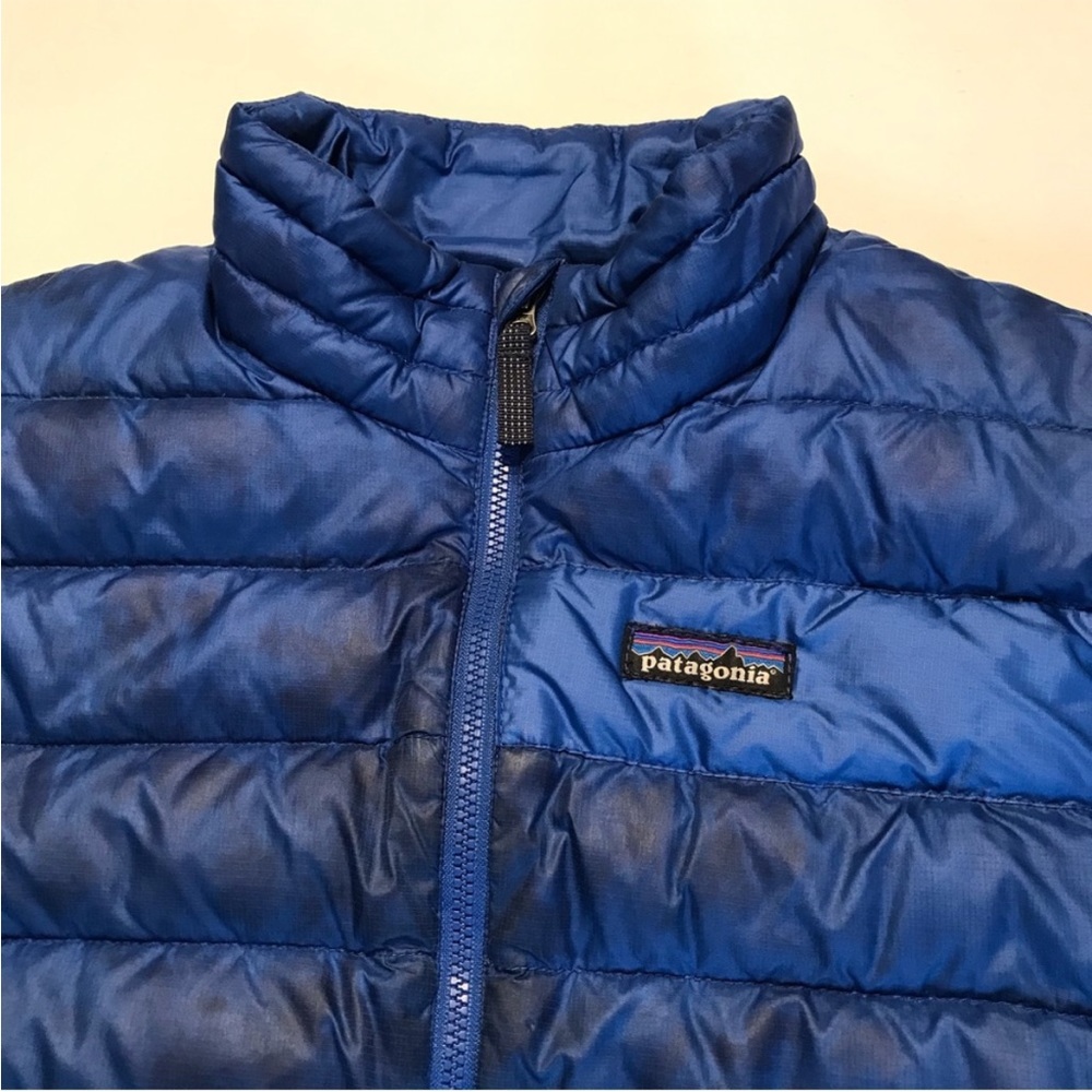 Patagonia Blue Down Sweater Puffer Jacket. staining on the front & back. Size 12